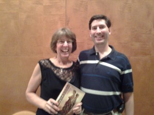 Joshua Paul Cane with author AB Westrick and her novel "Brotherhood" inside the Library of Virginia, Richmond, Va.