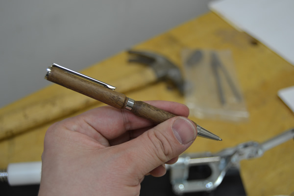 Holding a fresh pen.